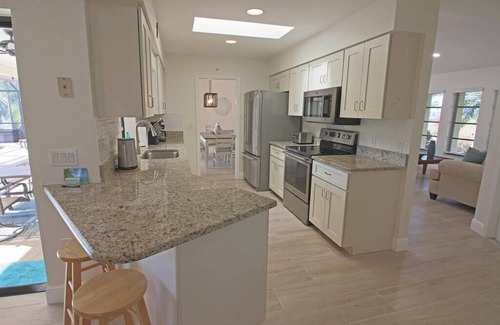 Pebble Beach House | Canal-Side: Pool Home in Rotonda West #61