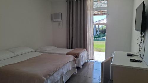 Ubatuba House | Capri Hotel