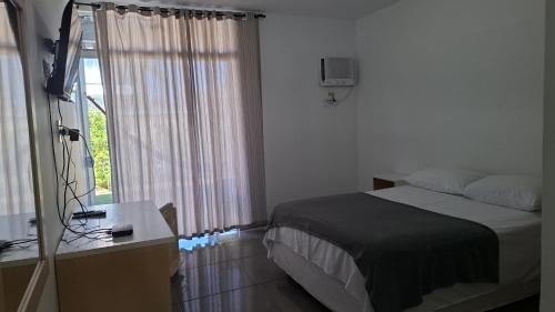 Ubatuba House | Capri Hotel