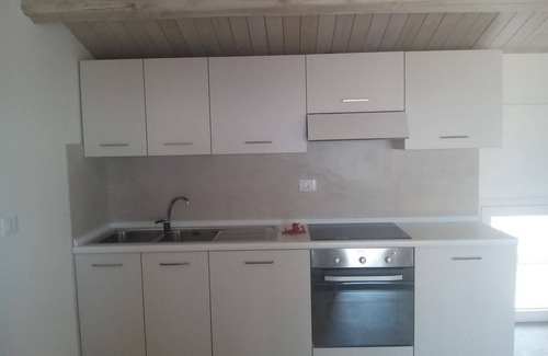Santa Caterina dello Ionio Apartment | Casa Vacanze con Terrazzino Panoramico e Arredi di Design