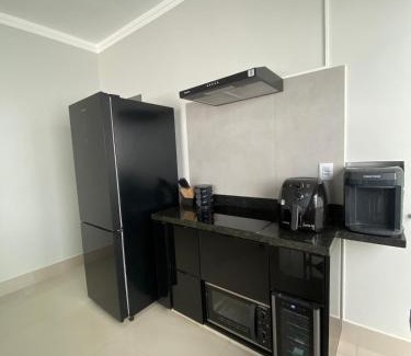 Paracatu House | Casa com área gourmet e ar condicionado