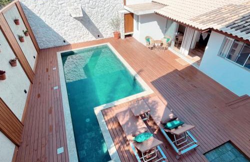 Santinho House | Casa com piscina em frente à Praia do Santinho