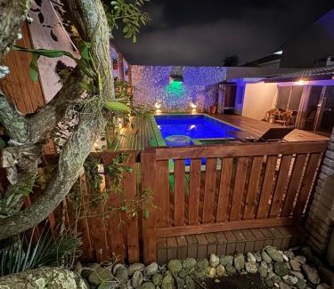 Santinho House | Casa com piscina em frente à Praia do Santinho