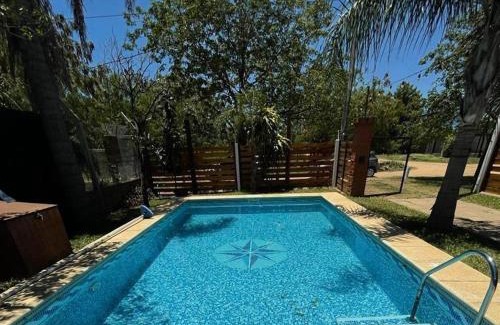 Paso de la Patria House | Casa con Pileta a Cuadras de la Playa