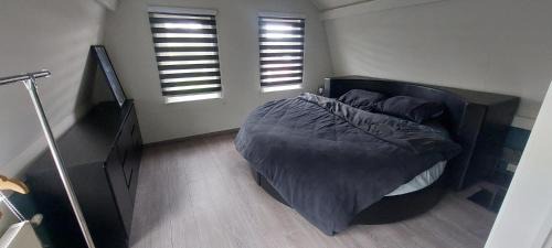 Koewacht House | Casa del huts