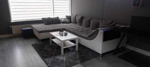 Koewacht House | Casa del huts