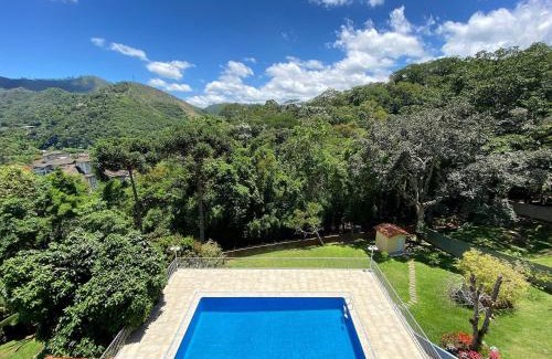 Itaipava House | Casa Feliz: serviço, hidro aquecida, piscina