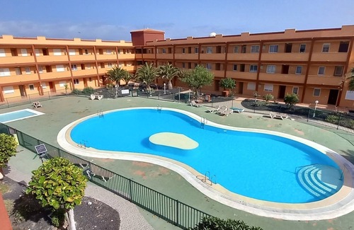Parque Holandes Apartment | Casa Karina. Spacious Fuerteventura Apartment with Pool & Balcony