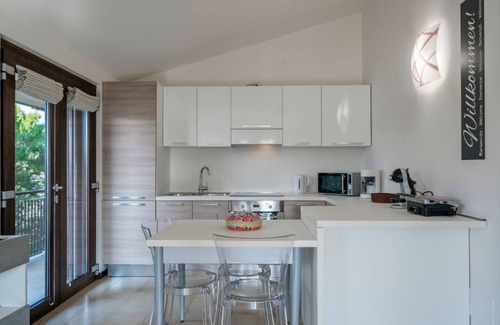 Lugana Apartment | Casa Lugana 15 - Studio apartment with lakefront pool near the center