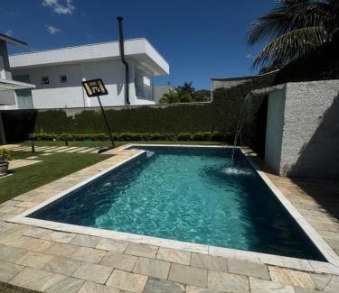 Jardim Acapulco House | Casa pet friendly Guarujá condomínio Jardim Acapulco