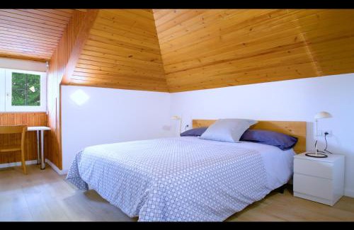 Breda Apartment | Casa Vacaciones pádel en Montseny by Can Forcadell