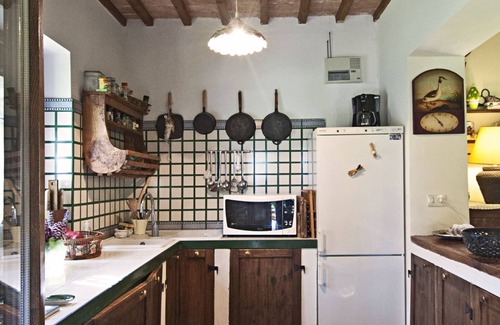 Monte Castello di Vibio Villa | Casale chimneys immersed in olive trees