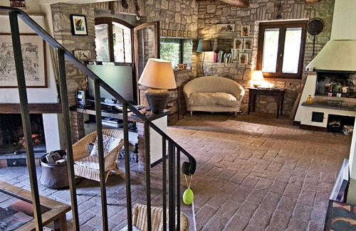 Monte Castello di Vibio Villa | Casale chimneys immersed in olive trees