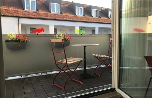 City Centre Regensburg Apartment | Centrally located maisonette apartment (25 sqm) with underfloor heating and balcony