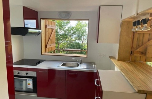 Malendure Ski Chalet | Chalet AYOUNAKA at sunset, panoramic view of the Caribbean Sea