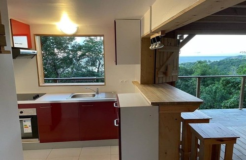 Malendure Ski Chalet | Chalet AYOUNAKA at sunset, panoramic view of the Caribbean Sea