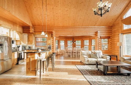 Mille-Isles Ski Chalet | ChaletsOasis Luxury Log Home with outdoor Hot Tub
