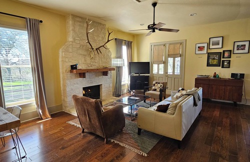 Kyle Hotel | Charming 2 bedroom cottage offering stunning sunset views nestled in the Texas Hill Country.