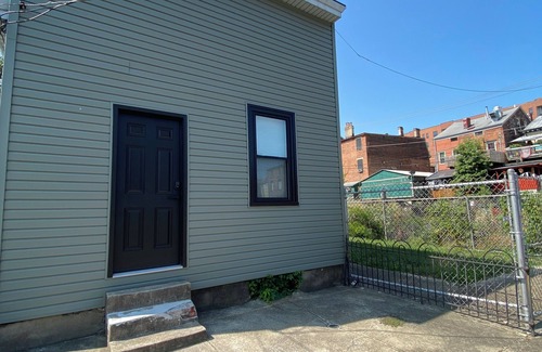 Covington House | Charming 2-bedroom house with WiFi, off street parking and side yard.