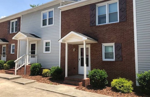 Downtown Greensboro House | Charming 2-bedroom townhome with WiFi, AC in Greensboro Big screen Smart TVs
