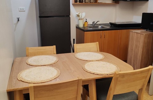 Cainta Condo | Charming 2BR Condo in Cambridge With Wifi, Smart TV