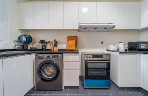 Dubai House | Charming 2BR Villa in Damac Hills by Deleguest