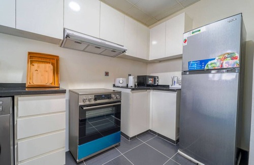 Dubai House | Charming 2BR Villa in Damac Hills by Deleguest