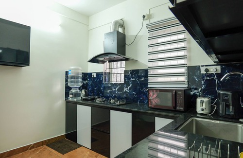 North Paravur Apartment | Charming 3-bedroom apartment with AC, WiFi in lovely Koonammavu