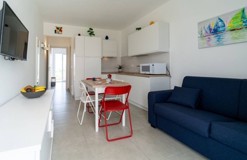 Pachino Apartment | Charming 40 sqm apartment with sea view, accommodating up to 4 guests, located within the renowned Borgo 84 residence, which features a swimming pool and a cycling path. The property is just 3 km from the center of Marzamemi, one of the most picturesque