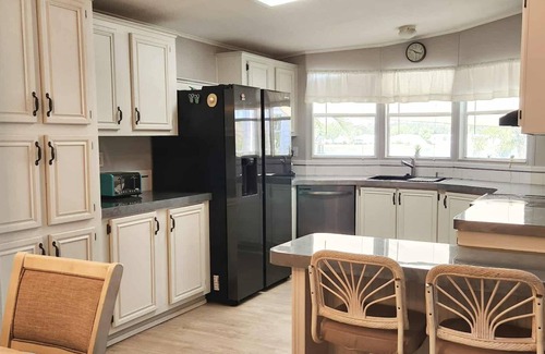 Braden River House | Charming 55+ community. Waterfront! Fantastic sunset views & private hot tub