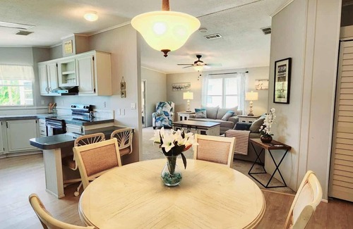 Braden River House | Charming 55+ community. Waterfront! Fantastic sunset views & private hot tub