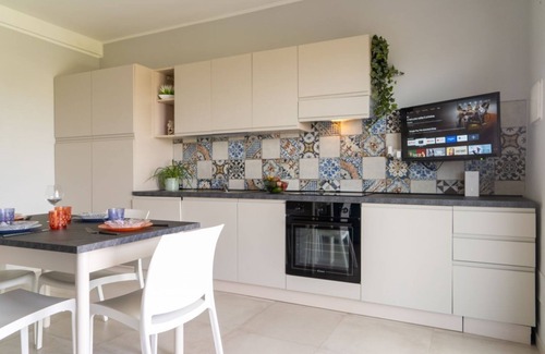 Pachino Apartment | Charming 75 sqm seaview apartment on two levels, for 5 people, located inside the renowned Borgo 84 residence, equipped with swimming pool and cycle path. The property is located just 3 km from the center of Marzamemi, one of the most fascinating seaside