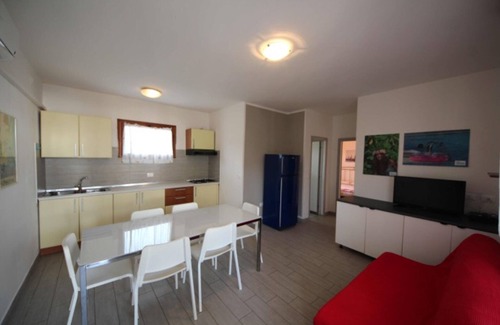 Rosolina Mare Apartment | Charming apartment with AC, garden and parking