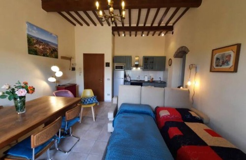 Massa Marittima Apartment | Charming apartment, complete and comfortable with terrace and panoramic view!