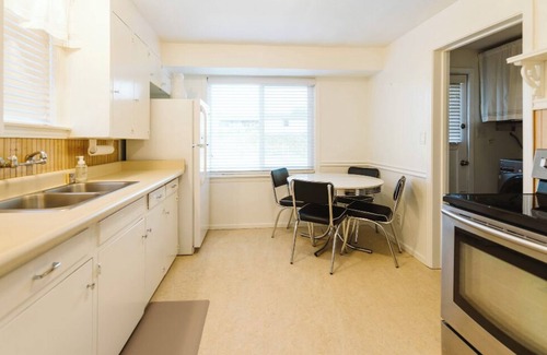 Olympia House | Charming bungalow, with covered parking, just a short walk from Capital Campus!