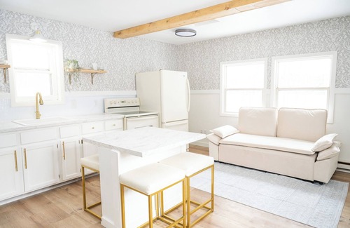 Rhinelander Cottage | Charming cottage In The Heart of Sugar Camp on Bass Lake - No Cleaning Fee!