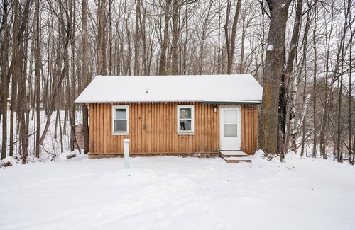 Rhinelander Cottage | Charming cottage In The Heart of Sugar Camp on Bass Lake - No Cleaning Fee!