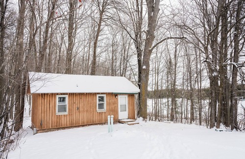 Rhinelander Cottage | Charming cottage In The Heart of Sugar Camp on Bass Lake - No Cleaning Fee!
