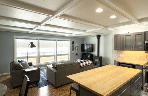 Stevens Point Cottage | Charming cottage nestled on the banks of the Wis River for next family vacation