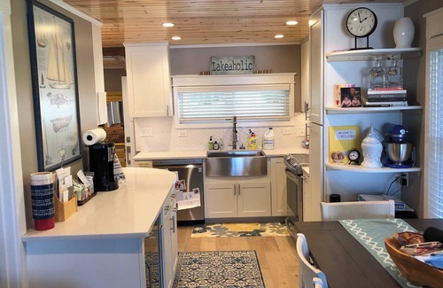 Rapid City Cottage | Charming & Cozy Torch Lake Waterfront Cottage