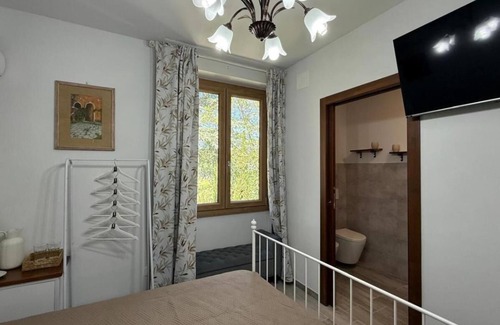 Dicomano House | Charming Guest Room in Villa Casavecchia with City, Garden, and Mountain Views