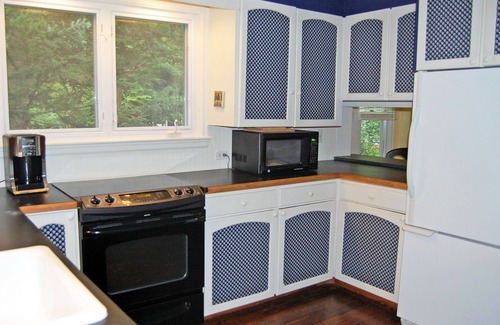 Maple City Cottage | Charming home near Glen Arbor with a porch, gas grill, lake views, & AC