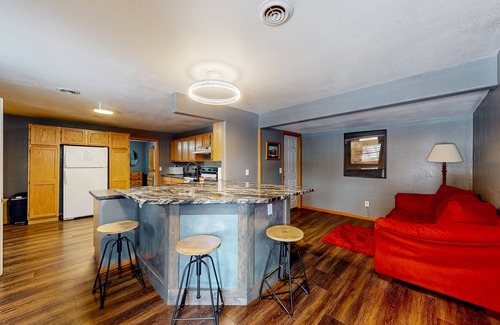 Lead House | Charming home with mountain view, private hot tub, deck, & two kitchens