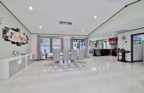 Lake Worth House | Charming Lake Worth Fun House with heated pool, game room, mini golf, WiFi!