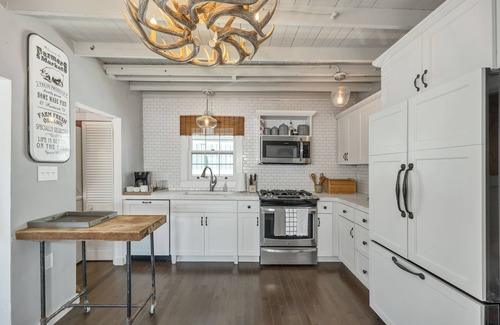 Weirs Beach House | Charming Lakefront Cottage Nearby to the Weirs with dock and sand beach