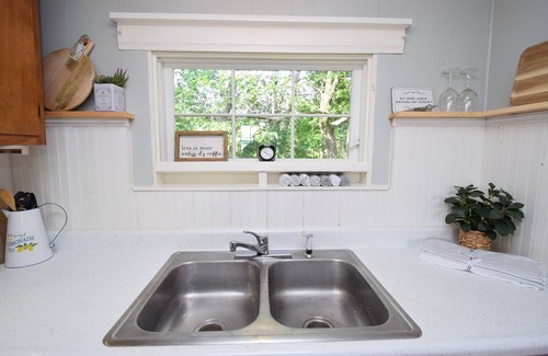 Webster Cottage | Charming Lakeside Cottage nestled on 40 private, wooded acres on Big Sand Lake