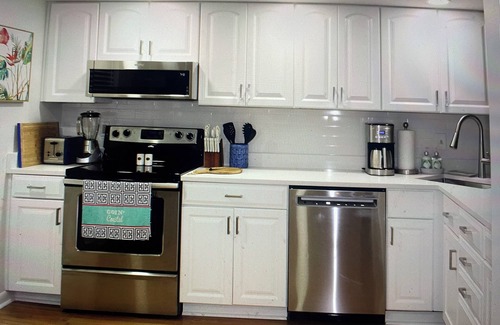 Jupiter House | Charming townhome in a vibrant and active gated golf community in Jupiter.