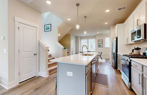 Goose Creek House | Charming townhouse with deck and washer/dryer, central AC, and WIFI