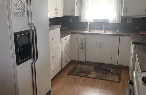 West Central Saskatchewan Cottage | Cheerful 3 Bedroom Cottage with Fireplace.