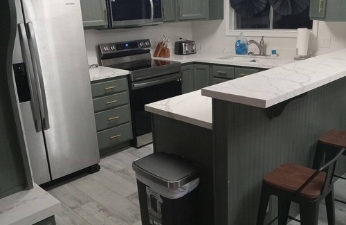 Swiss Manor House | ✓ Cheerful 4 bed/4 bath home w/large patio & yard